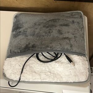 Gray and White Heated foot warmer